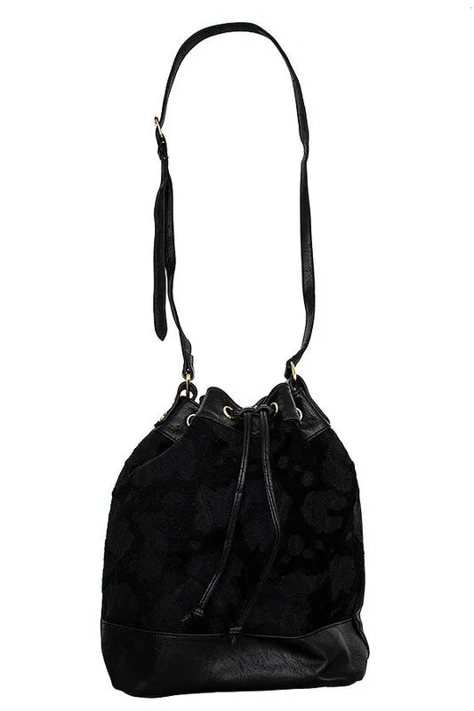COW PRINT DRAWSTRING SHOULDER BAG