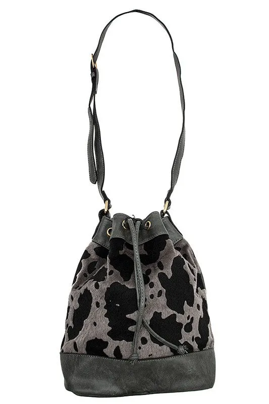 COW PRINT DRAWSTRING SHOULDER BAG