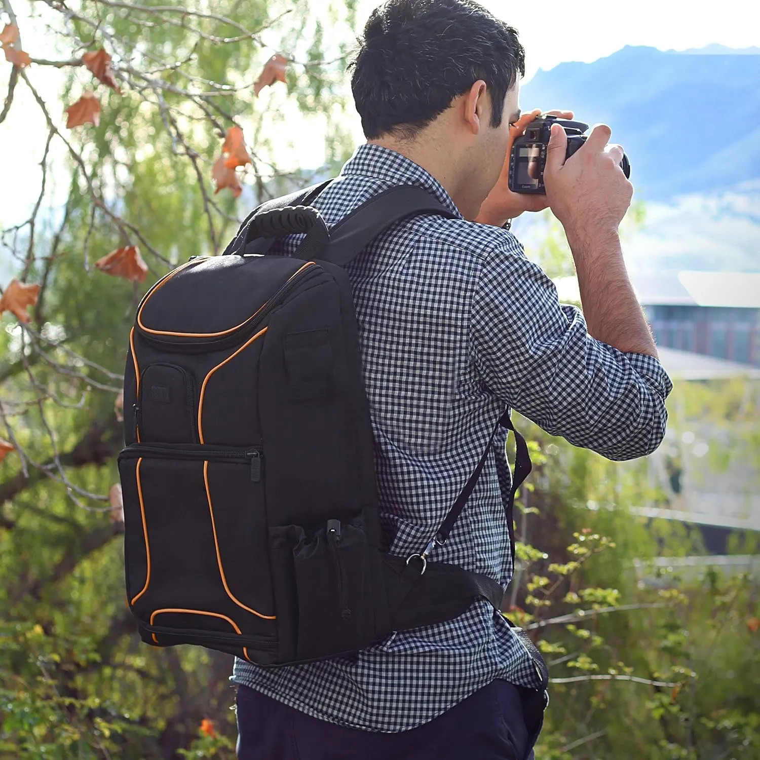 USA Gear Camera Backpack for Photographers DSLR/SLR/Mirrorless Photography Camera Bag with Laptop Compartment, Waterproof Rain Cover & Tripod Holder, Compatible with Canon/Nikon/Sony (Orange)